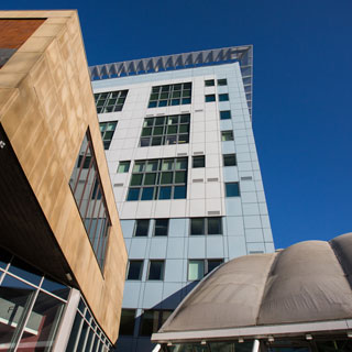 View of the Richmond building and it's entrance, looking up from the ground