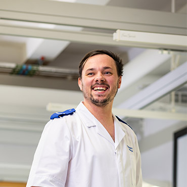 A student nurse smiling.