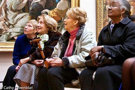 A group of female dementia patients sat together. Grid box size.