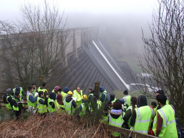 Students wearing high-vis jackets and hard hats in Whitby.