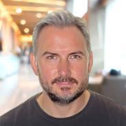 Professional style photo of Gavin Mander, speaker at the AI Forum 2024