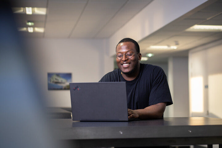 Student using a laptop.