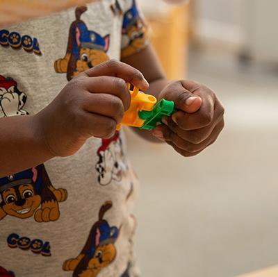 Playing with connecting blocks at the nursery