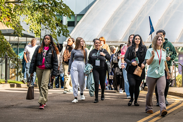 Prospective undergraduate students taking a campus tour