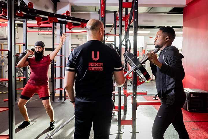 Unique staff assisting with rig work out