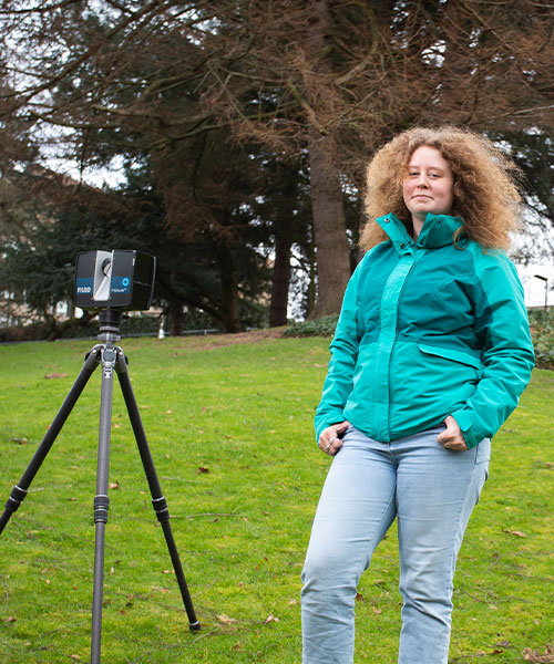 Student in an outdoor archaeological dig