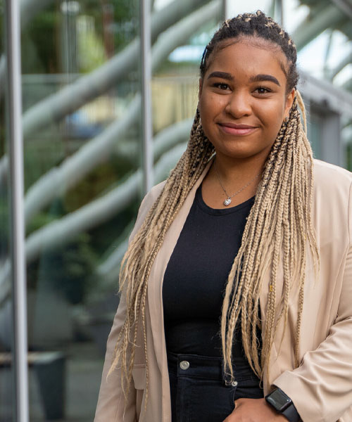 Postgraduate Public Health student smiling towards the camera